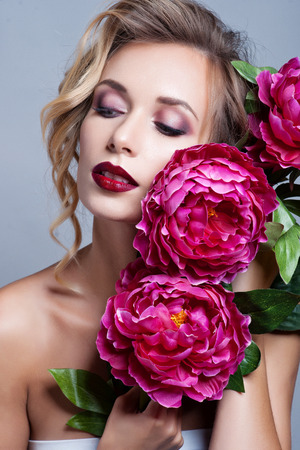 Beautiful Girl with Spring Flowers.Fresh skinの写真素材