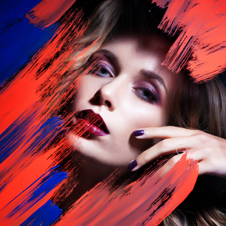 Portrait of beautiful blonde woman with curly hairstyle and bright makeup, perfect skin, skincare, spa, cosmetology. Sexy vogue woman face, sensual beauty girl model. Natural look. studio, isolated.の写真素材