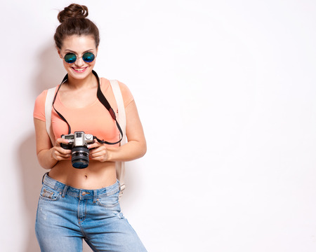 Cool hipster student woman wearing eyewear glasses . Caucasian female university student looking at camera smiling happy.の写真素材