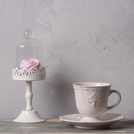 Closeup of cup of tea on vintage wooden background.の写真素材