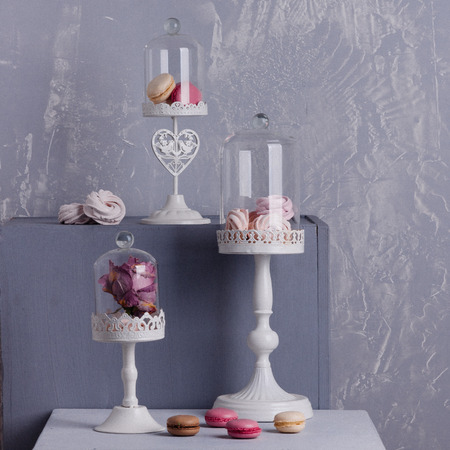 Three original stand desserts on a gray background.の写真素材