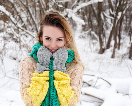 Young woman winter portrait. Shallow dof.の写真素材