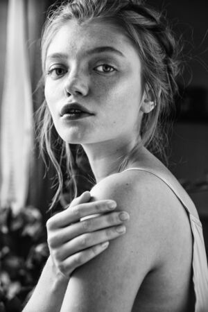 stylish hipster woman with fern leaf embracing. girl portrait with natural herb, boho sensual bride. romantic moment. rustic eco wedding concept. beautiful woman relaxing.の写真素材