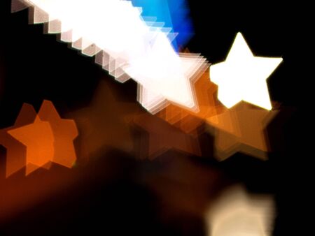 It is Star bokeh lights on black background.の写真素材