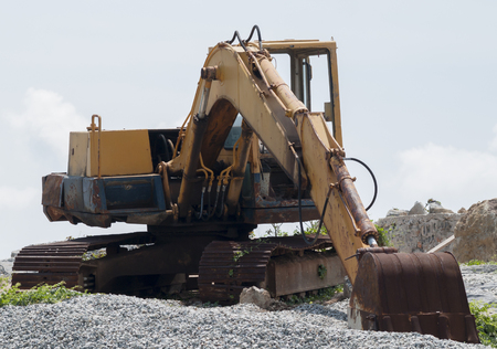 Old loader excavator machineの写真素材