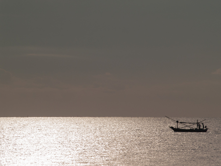 Fishing Boat at Sunriseの写真素材