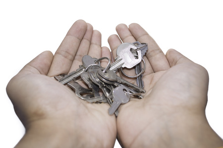 Hand and keyの写真素材