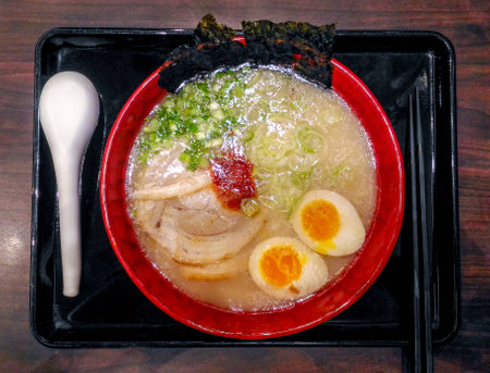 japanese ramen noodle with pork and seaweed on wooden tableの写真素材