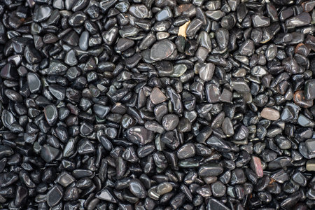 black pebbles texture background, stone pebbles background.の写真素材
