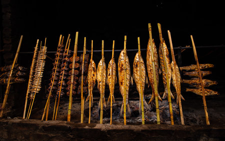 Grilled mackerel on the stove in a restaurant in Hoa Binh VietNamの写真素材