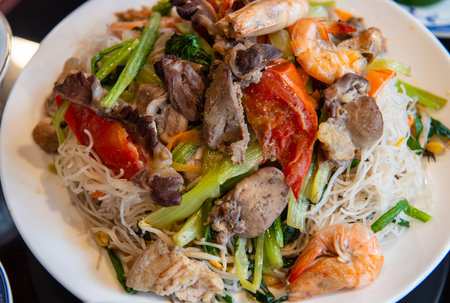 Thai style noodle with prawns and vegetables, Thailand.