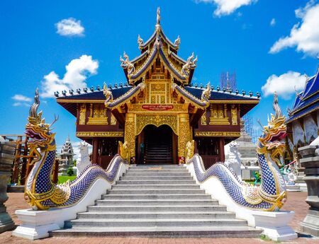 Thai art, Naka statue on staircase balustrade at Thai Buddhist pagodaの写真素材