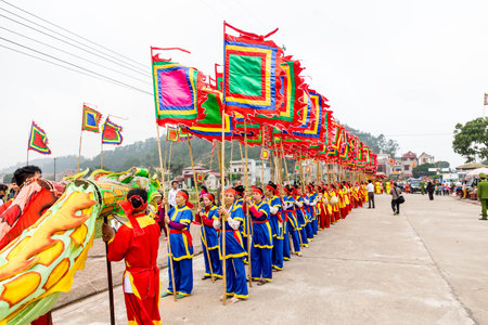 Unidentified people in traditional costume at the annual Umbrella festival in Chiang Mai, Thailand.