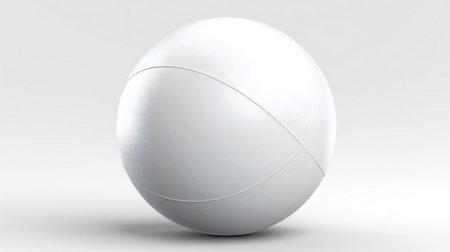 a white beach ball isolated in white studio backgroundの素材