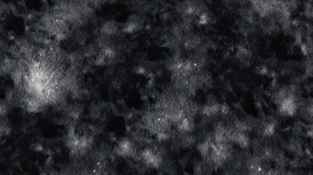 Grunge abstract black and white background with spotty pattern.の素材