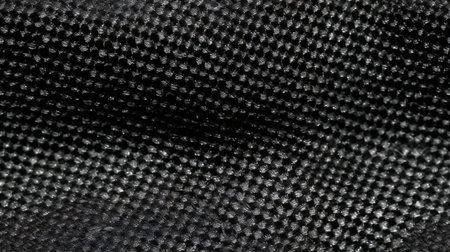 black fabric texture useful as a background with copy space for text or imageの素材