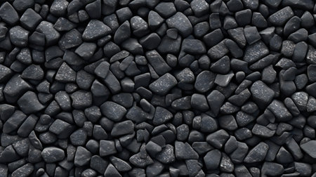 Pile of black stones as background texture.の素材