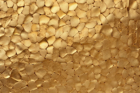 golden background of stone wall texture for design with copy space for text or image.の素材