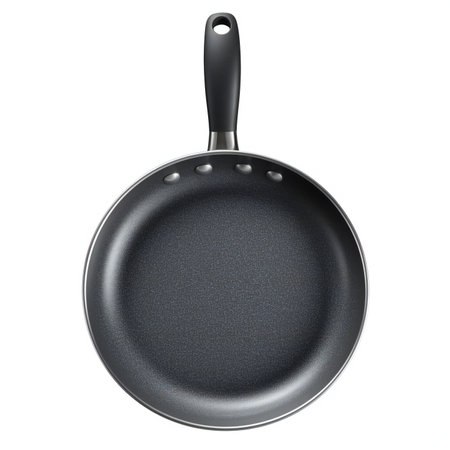 Black frying pan isolated on white background.の素材