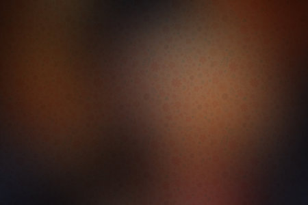 abstract brown background with some smooth lines in it and some spots on itの素材
