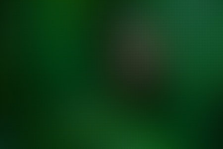 abstract green background with some smooth lines in it and some spots on itの素材