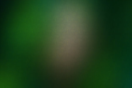abstract green background with some smooth lines in it and some spots on itの素材