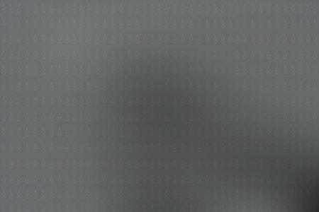 abstract background with a pattern of black squares on a gray backgroundの素材