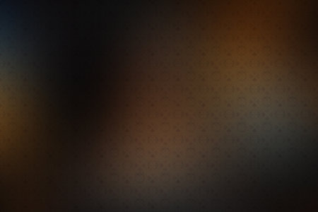 abstract background with black and brown spots and light spots in the centerの素材