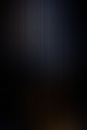abstract black background with some smooth lines in it and some blur on itの素材