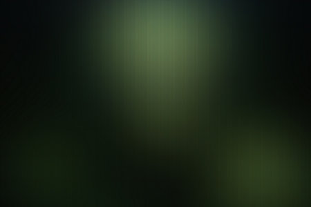 abstract green background with some smooth lines in it and some spots on itの素材