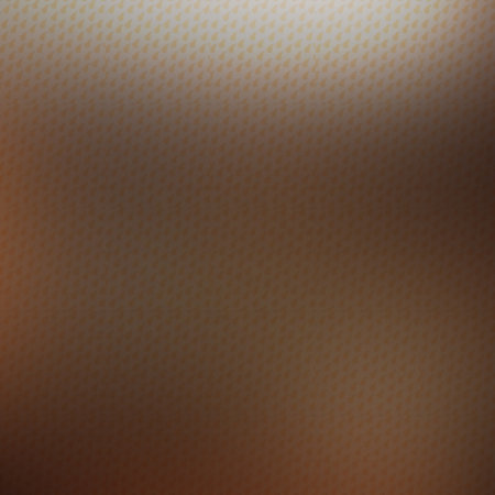 abstract background with a pattern of dots on a dark brown backgroundの写真素材