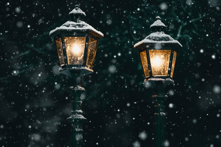 Christmas and New Year background with street lamp and falling snowflakesの素材