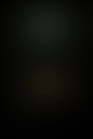 abstract dark background with some smooth lines in it and some spots on itの写真素材