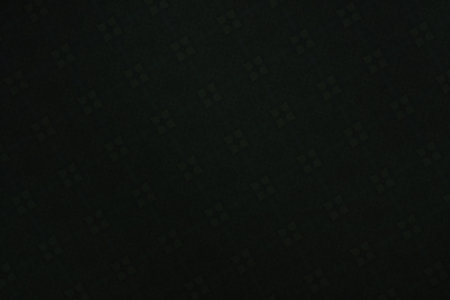 close up of a black background with some squares and dots in itの写真素材