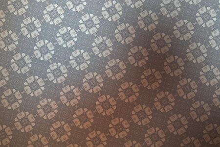 close up of a pattern on a wall in a room with wallpaper