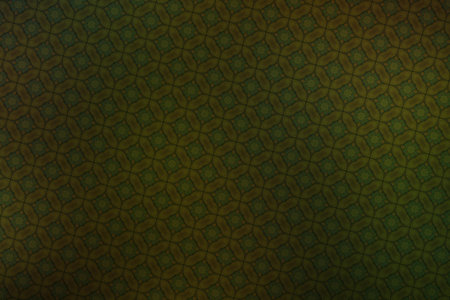 Textile cloth green with a pattern of hexagons in the middleの写真素材