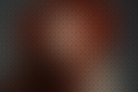 abstract brown background with some smooth lines in it and some spots on itの写真素材