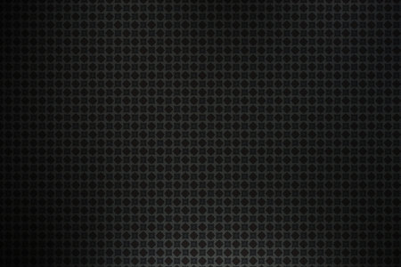 Dark metal background with a pattern of hexagons.の写真素材