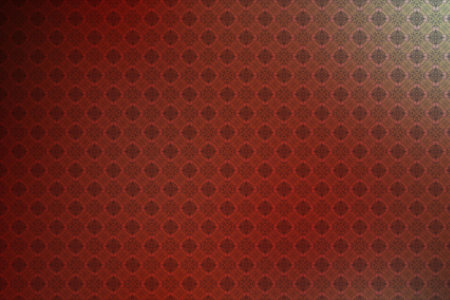 Red vintage background with a pattern of rhombus and dots.の写真素材