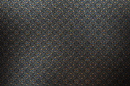 Textile cloth black and gold with a kaleidoscope pattern.