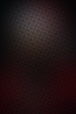 Abstract background with a pattern of hexagons in red and black colorsの写真素材