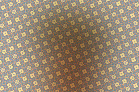 Decorative wallpaper in the form of square tiles. Design element for book covers, presentations layouts, title backgrounds. Digital collage.の写真素材