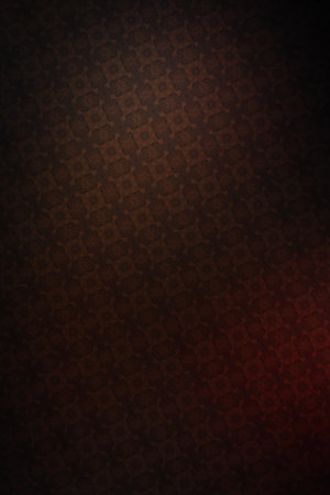 Dark brown background with a pattern of squares and rhombuses.の写真素材