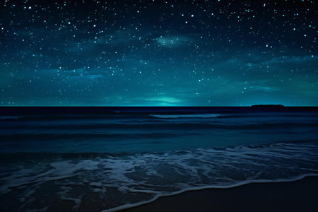 beautiful night landscape with starry sky over sea and sandy beachの素材