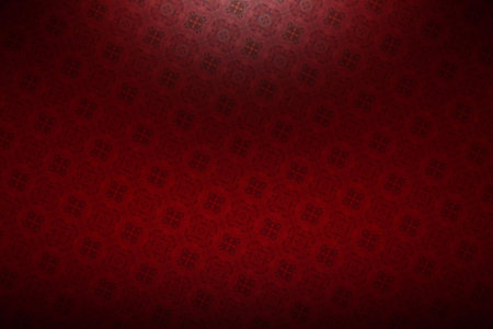 red vintage background with some soft shades on it and some light on itの写真素材