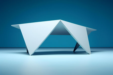 a white origami table isolated on blue backgroundの素材