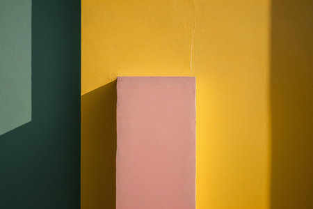 pink and yellow color wall background and shadow on the wall.の素材
