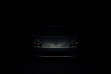 car in the dark, closeup of photo with shallow depth of fieldの素材
