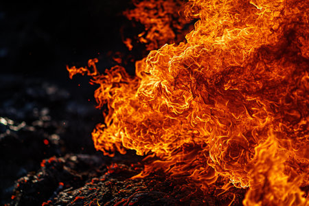 Fire flames on black background. Abstract blaze fire flame texture background.の素材