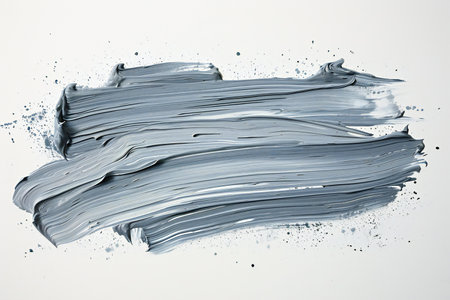Blue paint brush strokes isolated on white background.の素材